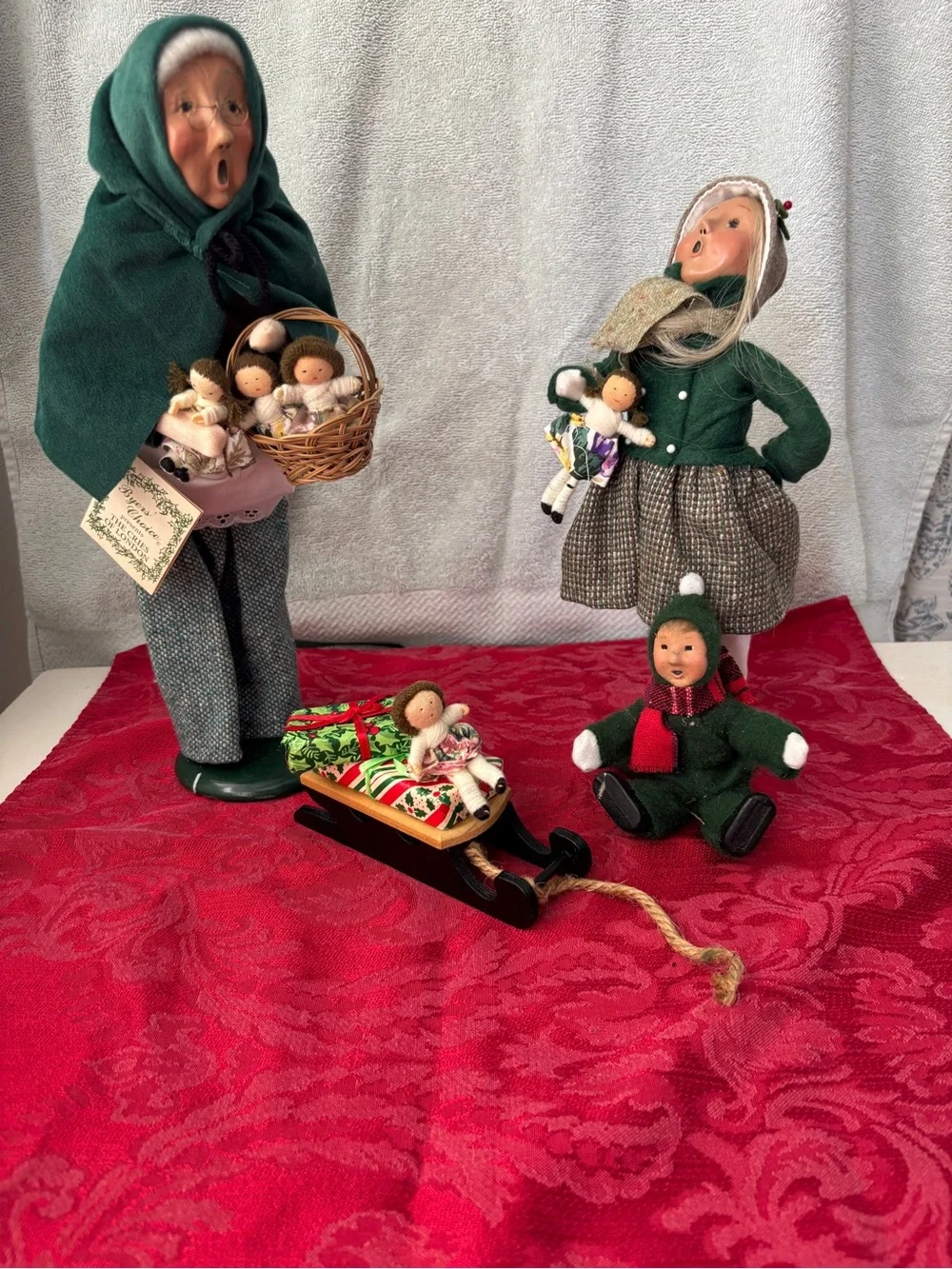 Byers' Choice Carolers- 4 piece doll vendor set.
